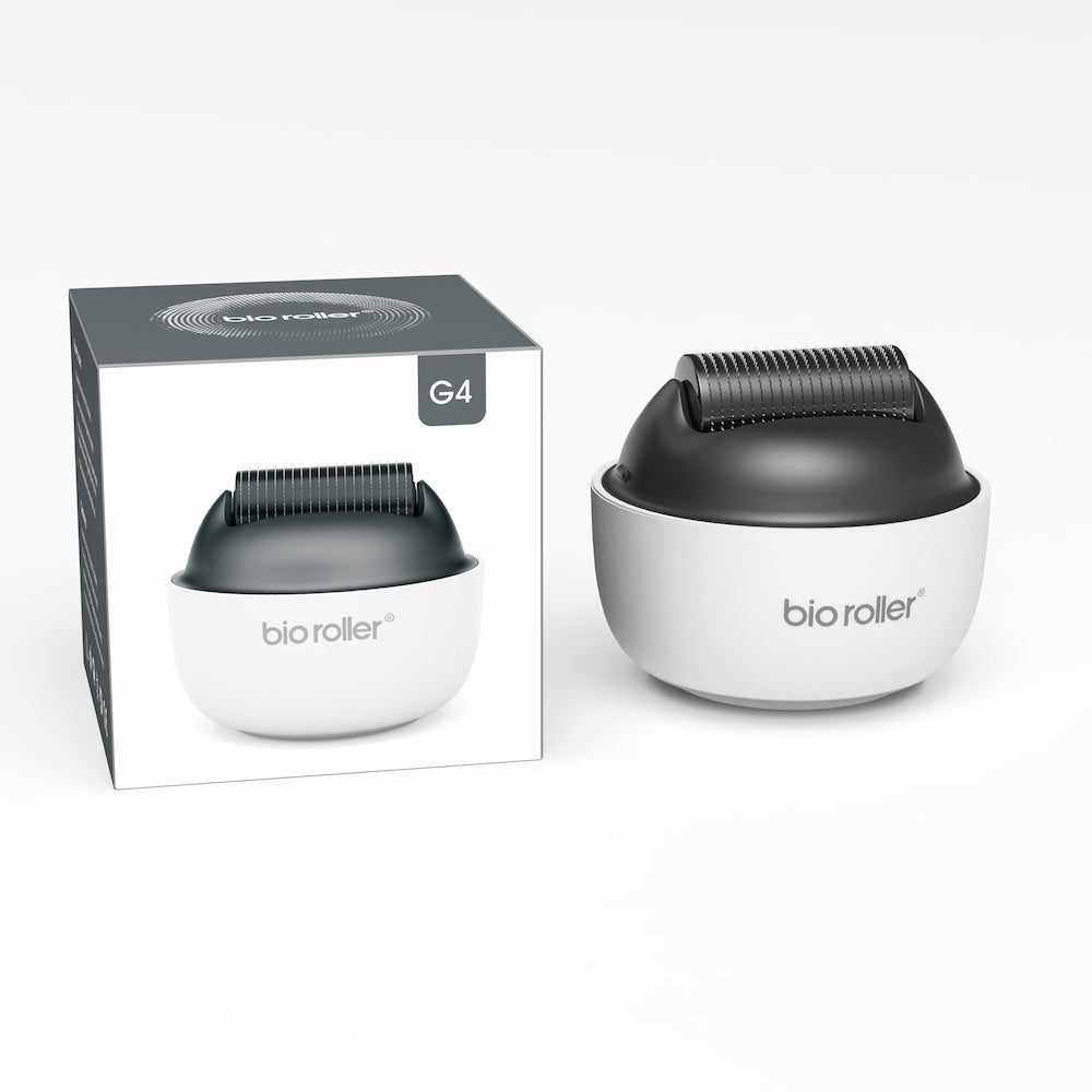Bio Roller G4 microneedling-rolo junto com a embalagem do produto, projetado para tratamento facial, rejuvenescimento da pele e melhor absorção de soro.