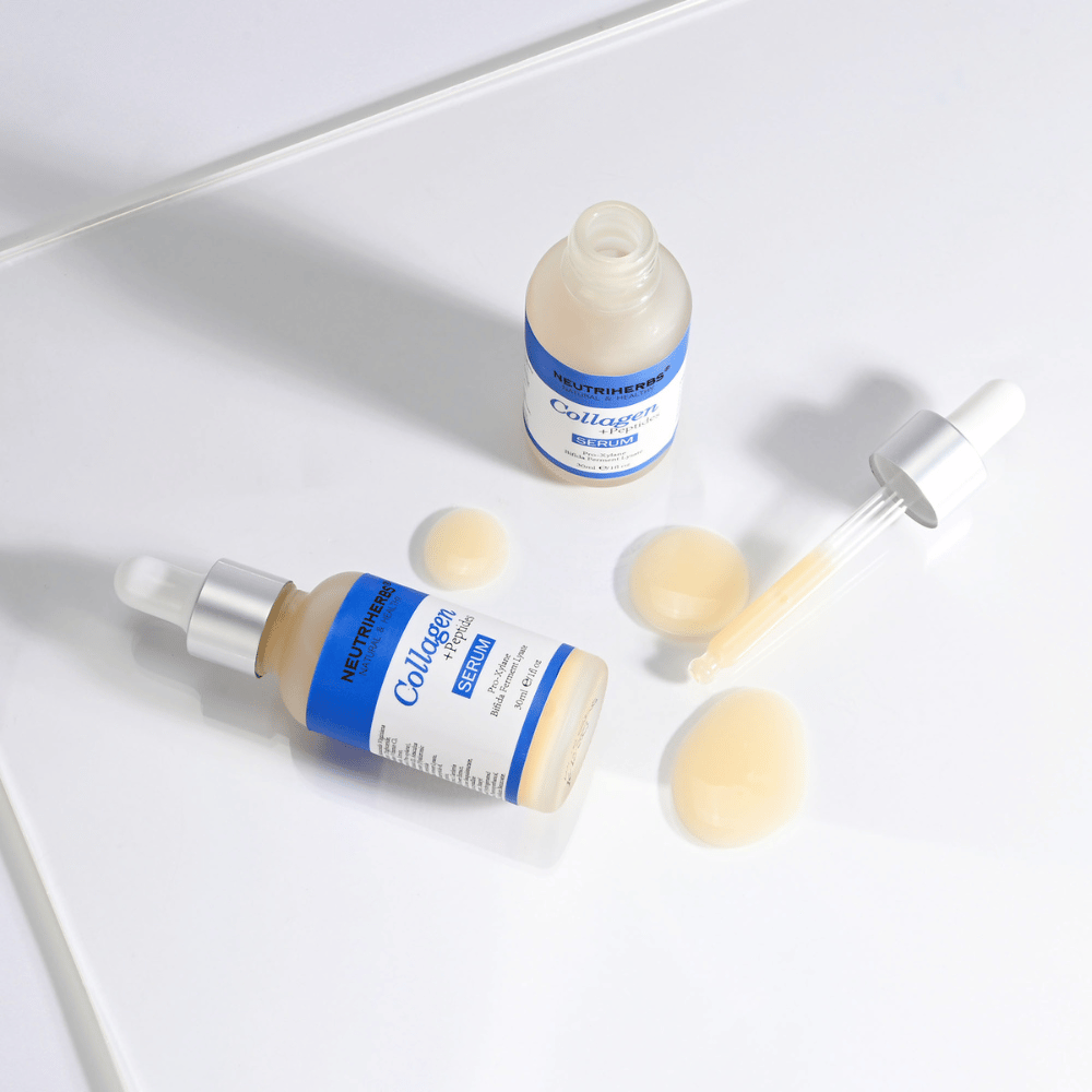 Neutriherbs Collagen + Peptides Serum 30 ml com frasco aberto, conta-gotas e textura do sérum. Imagem de perto que mostra a consistência sedosa e o prático aplicador com conta-gotas para uma dosagem precisa.
