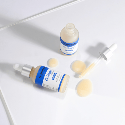 Neutriherbs Collagen + Peptides Serum 30 ml com frasco aberto, conta-gotas e textura do sérum. Imagem de perto que mostra a consistência sedosa e o prático aplicador com conta-gotas para uma dosagem precisa.