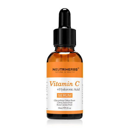 Neutriherbs Vitamin C + Hyaluronic Acid Serum 30 ml sobre fundo branco. Sérum facial com vitamina C e ácido hialurónico que hidrata a pele, proporciona maior luminosidade e contribui para um tom de pele mais uniforme.